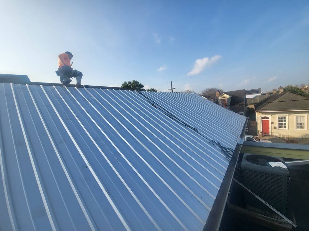 Crew on a new metal roof
