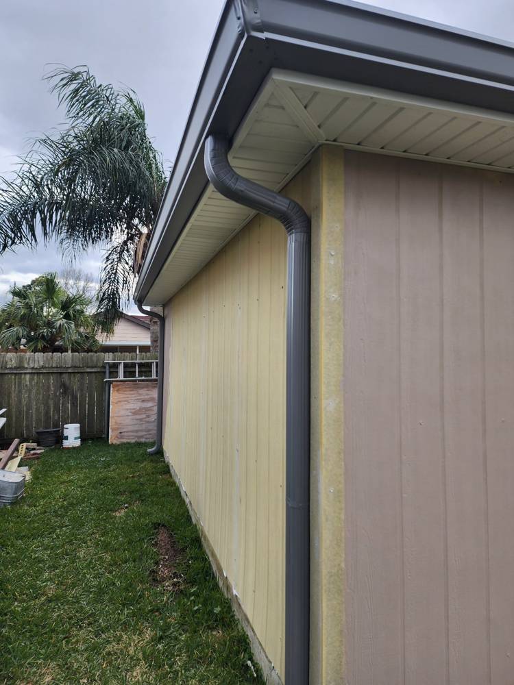 New seamless gutters and downspout on a New Orleans home